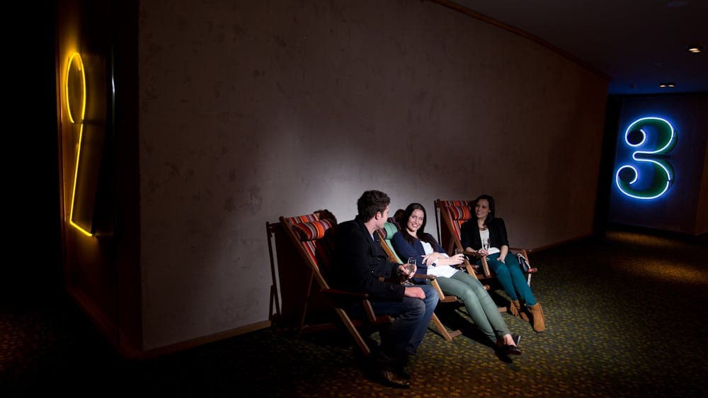 Cinema goers waiting for a movie to start