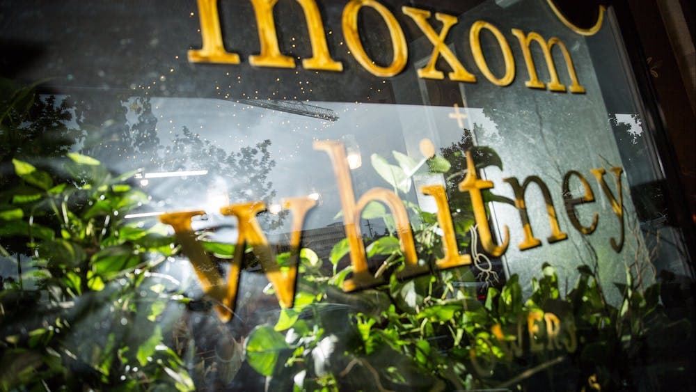 Moxom + Whitney front window