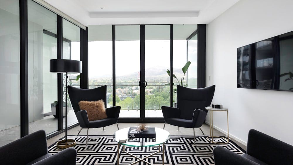 Situated on a high floor with breathtaking views over Glebe Park and Mount Ainslie