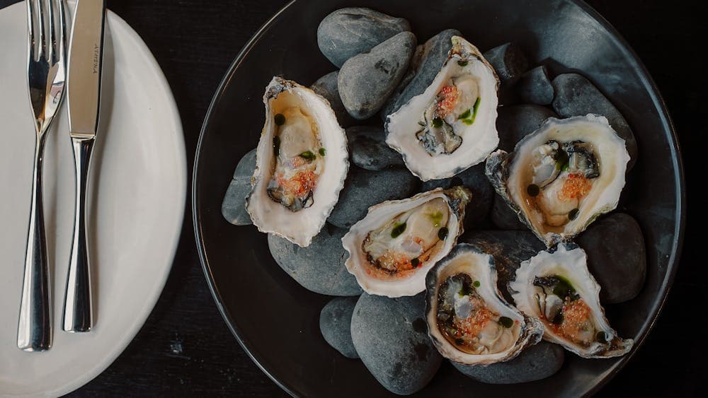 Appellation oysters, lemon myrtle vinegar, finger lime