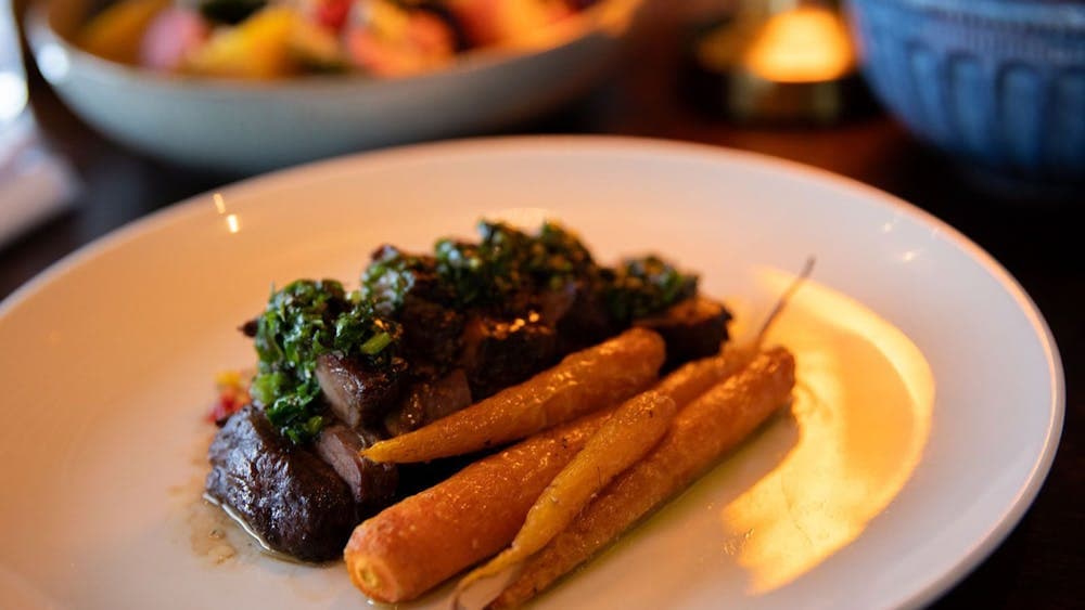 Lamb Rump Cap – Succulent lamb with glazed carrots, tomato salsa and chimichurri