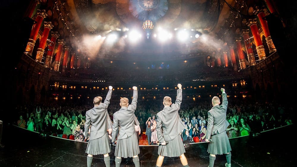 Celtic thunder performing to a large crowd