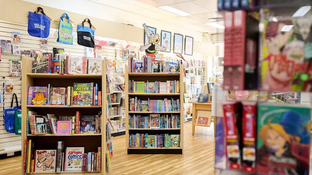 Wooden Book Shelves filled with graphic novels