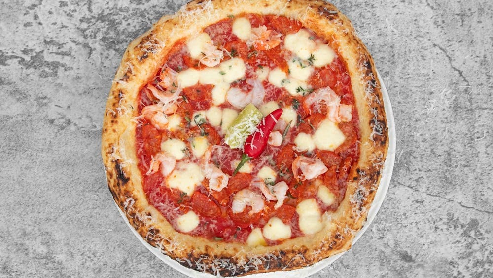 San Marzano Tomatoes, Fior de latte, Garlic King Prawn, Chorizo,  Spicy Hot Peppers & Parsley