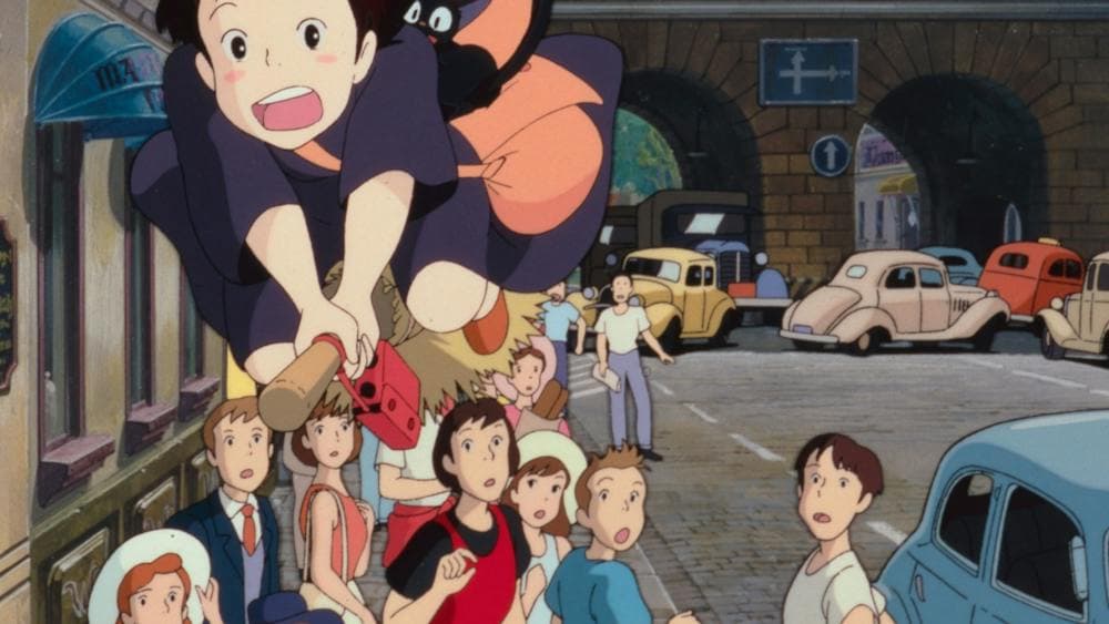 Animation of a young girl on a broomstick with cat flying over gasping crowds